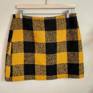 Black and yellow mini skirt